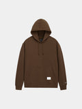Alpha Industries Essential Hoodie in Espresso with front pocket, drawstrings, and small white label on the lower front.