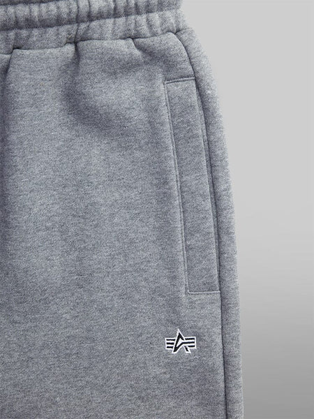 Close up pocket view of the Women's Essential Sweatpants in medium charcoal heather (gray) by Alpha Industries.