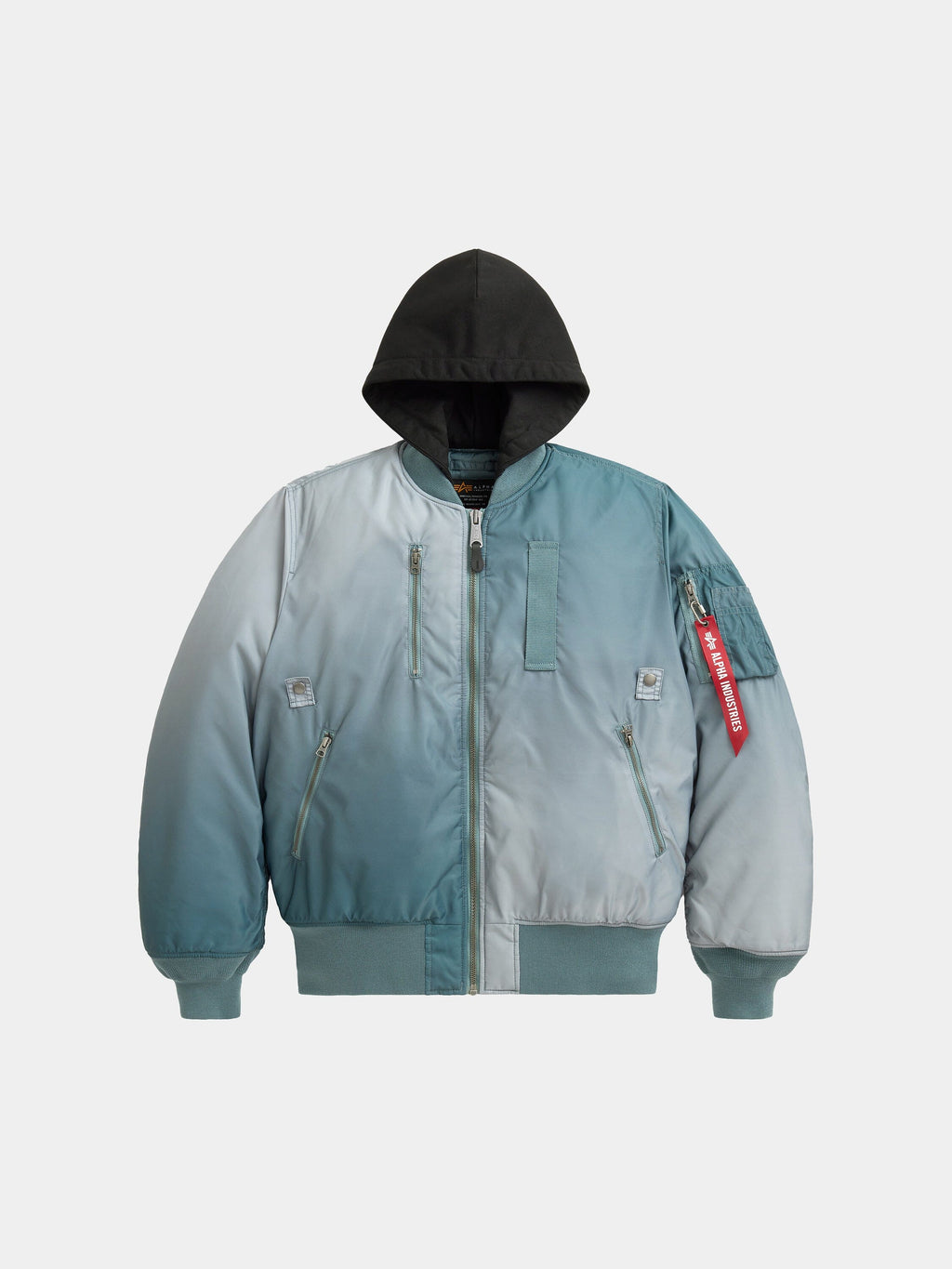 Alpha Industries Gradient Washed Flight Jacket in Aviator Blue with gradient design, black hood, front zipper, zippered pockets, red Remove Before Flight tag.