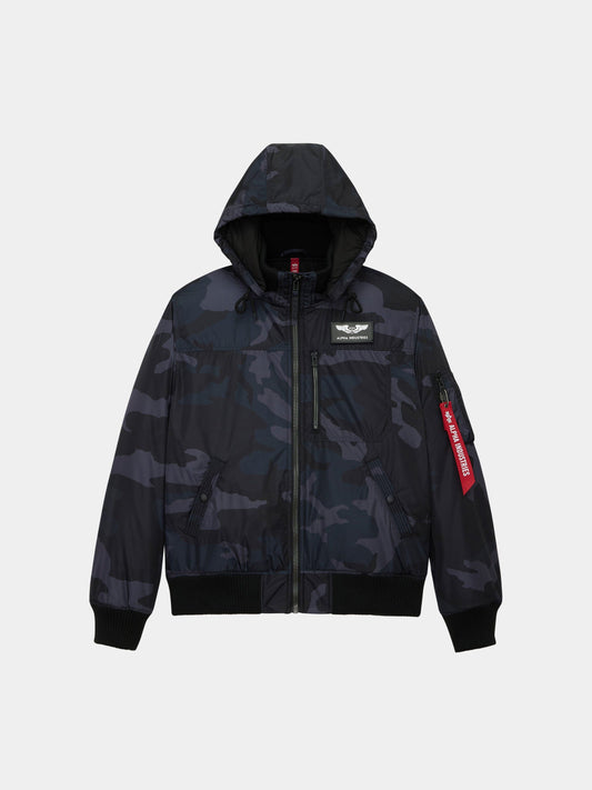 Alpha Industries Hooded Rib Flight Jacket in Black Woodland Camo with zippered pockets, ribbed cuffs and hem, utility sleeve pocket.