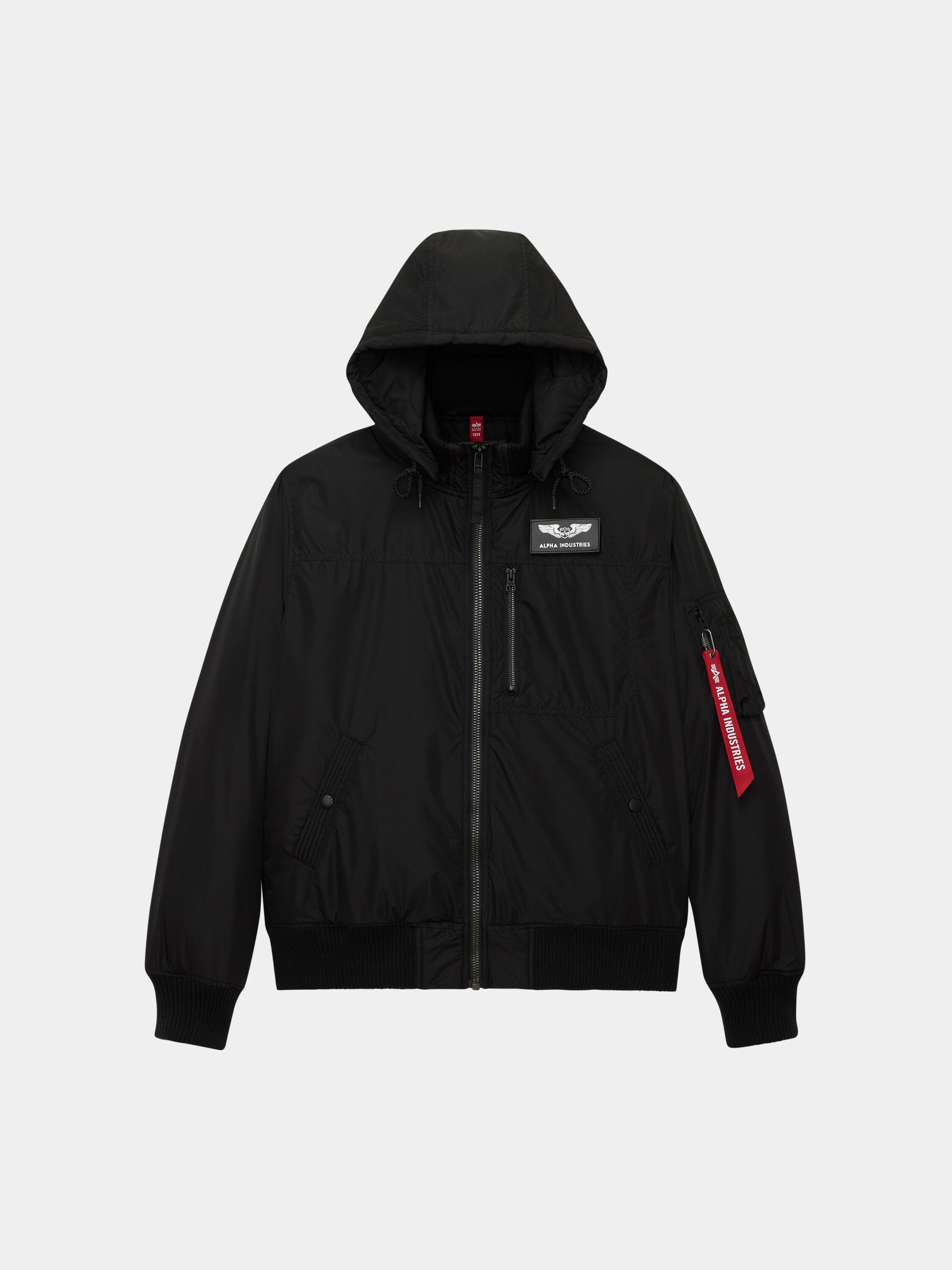 Alpha Industries Hooded Rib Flight Jacket in black with front zipper, chest and sleeve pocket, ribbed cuffs and hem, red tag on sleeve.