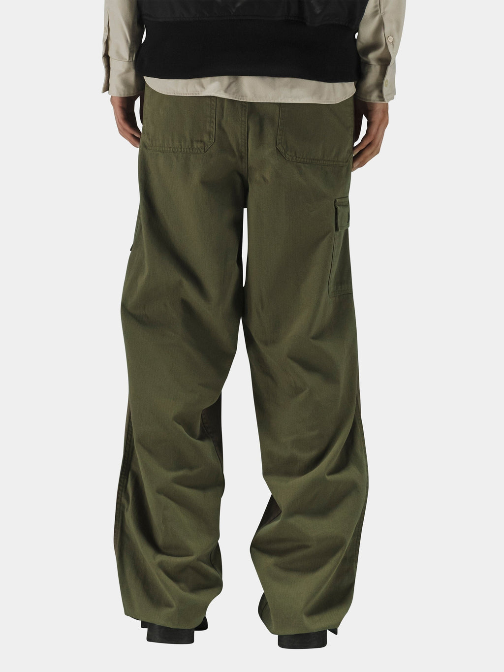 Alpha Industries Hungarian Fatigue Mod Pant in olive green cotton herringbone, beige shirt, and black jacket.