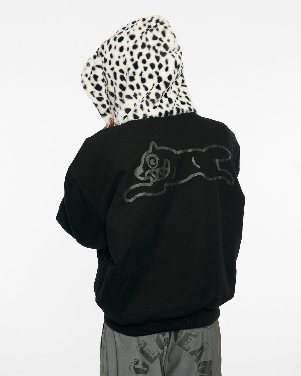 ICECREAM X ALPHA FAUX FUR FULL ZIP UP - On model - back close-up reversed black side running dog