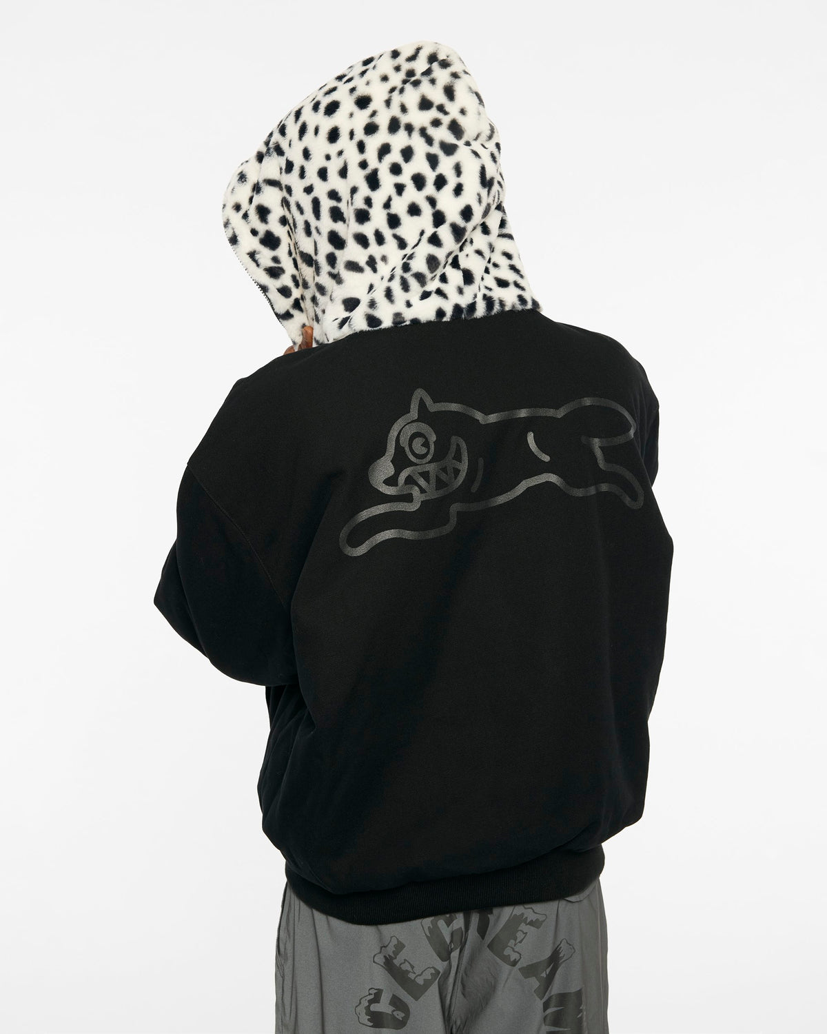 ICECREAM X ALPHA FAUX FUR FULL ZIP UP - On model - back close-up reversed black side running dog