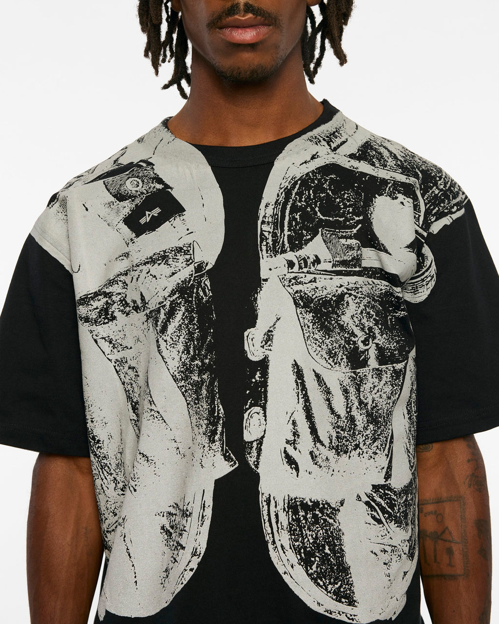 ICECREAM X ALPHA GRAPHIC TEE - On model - front close-up of vest graphic