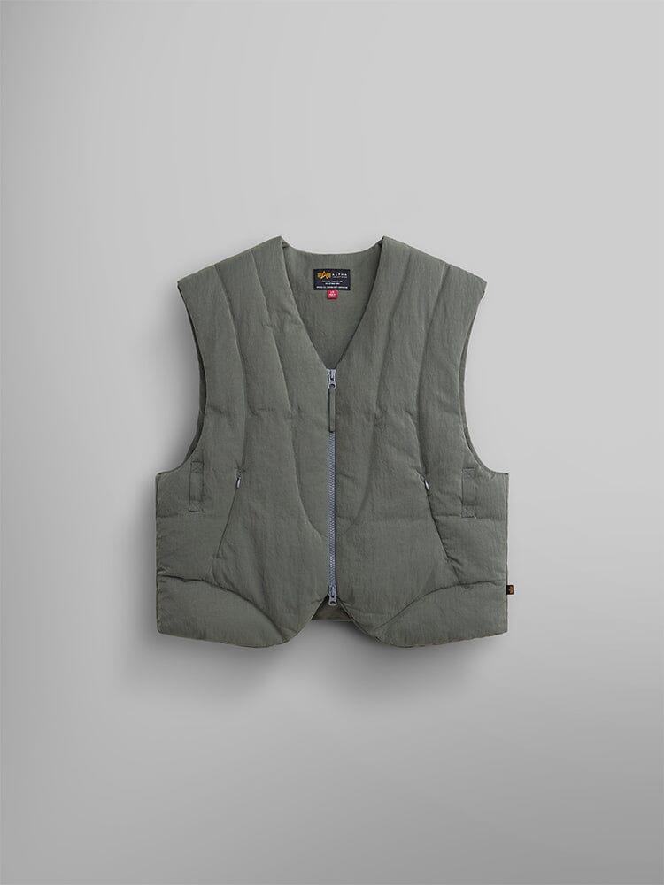 The Field Gray Insulated Vest from Alpha Industries is a quilted sleeveless jacket made from water-resistant nylon with a front zipper.