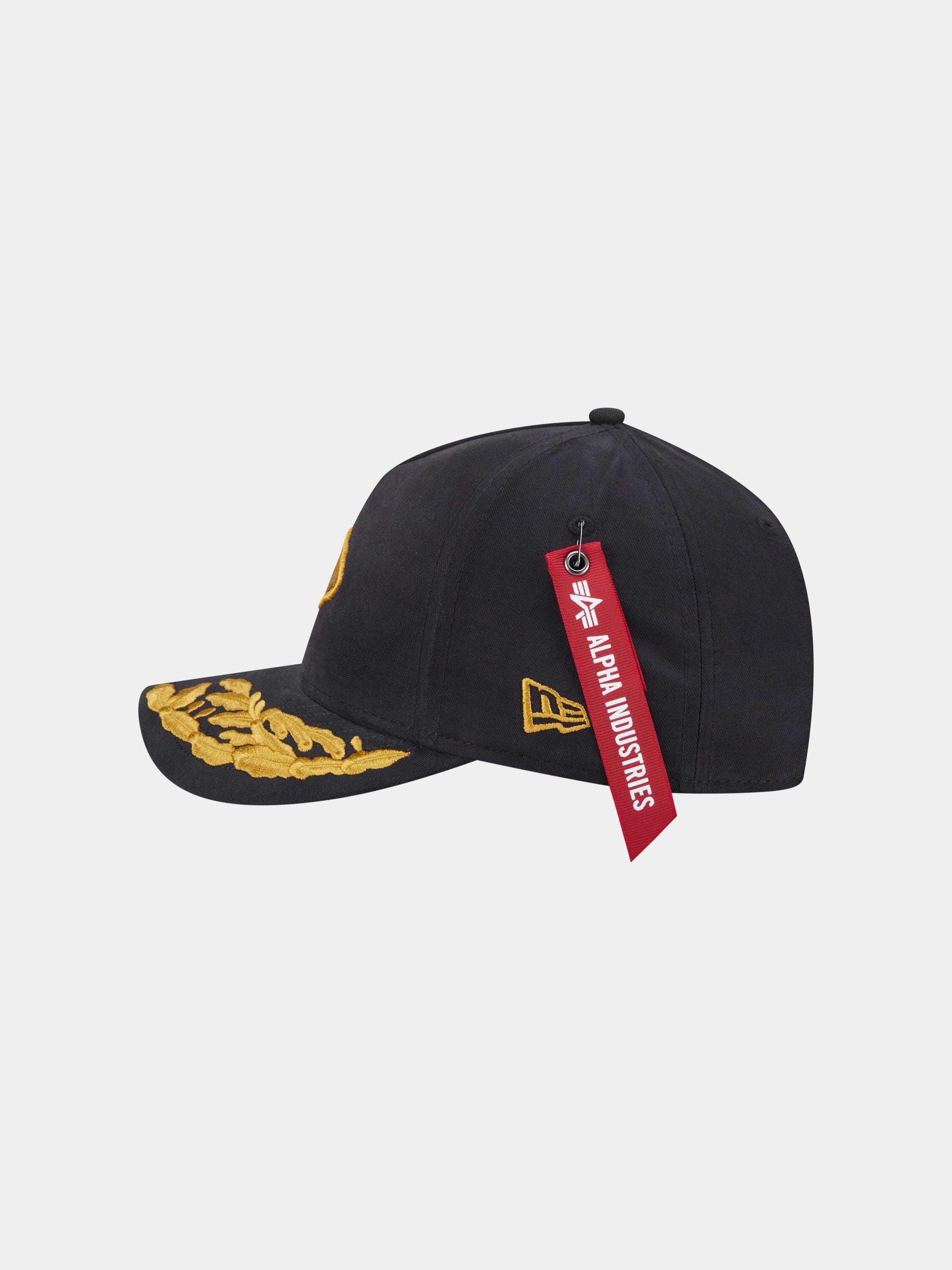 Kansas City Chiefs X Alpha X New Era 940 Mc Cap by Alpha Industries with yellow embroidered logos, red Alpha tag, adjustable fit.