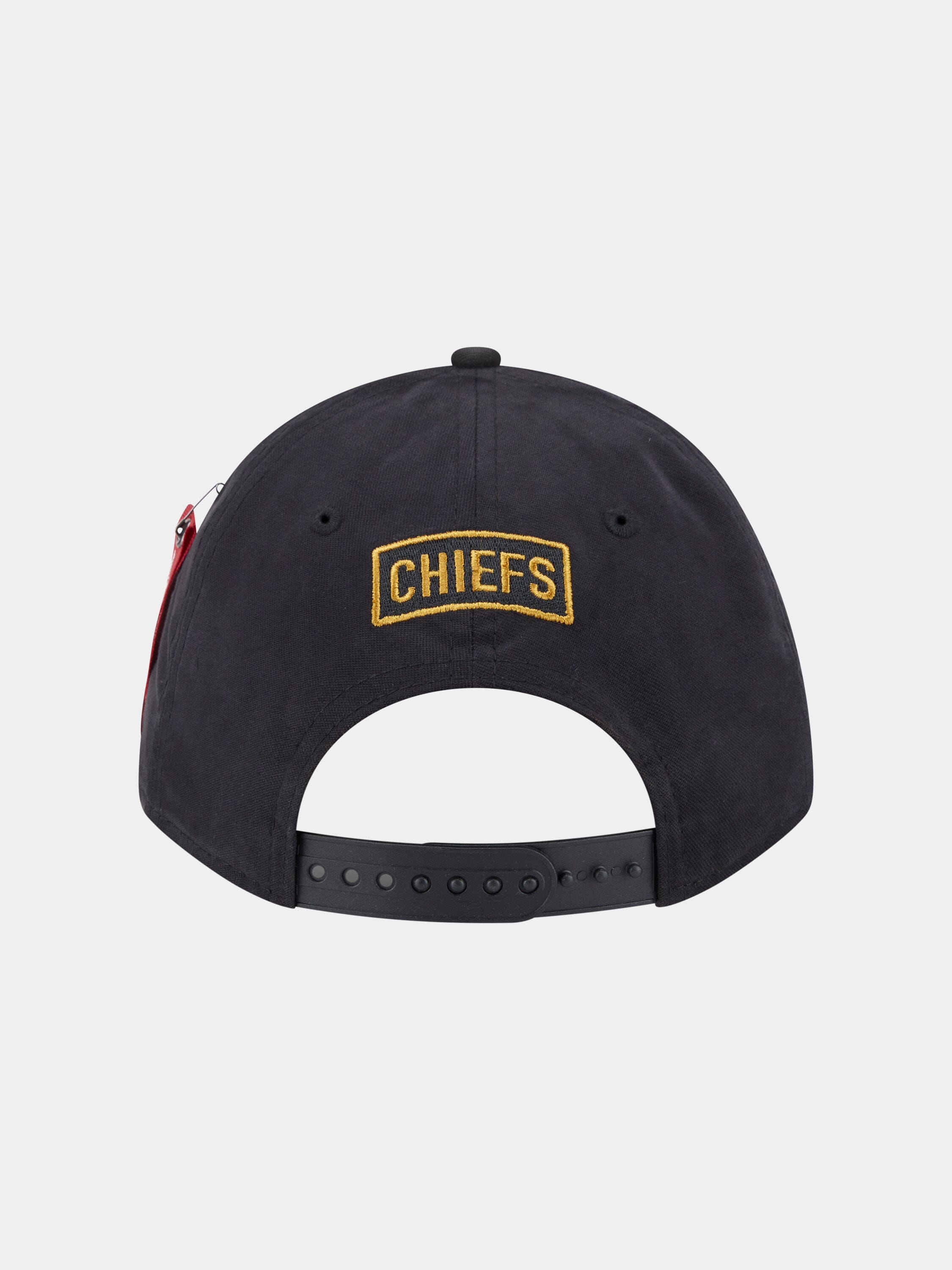 Alpha Industries Kansas City Chiefs 940 Mc Cap in black with "Chiefs" embroidered in yellow above an adjustable snapback strap.