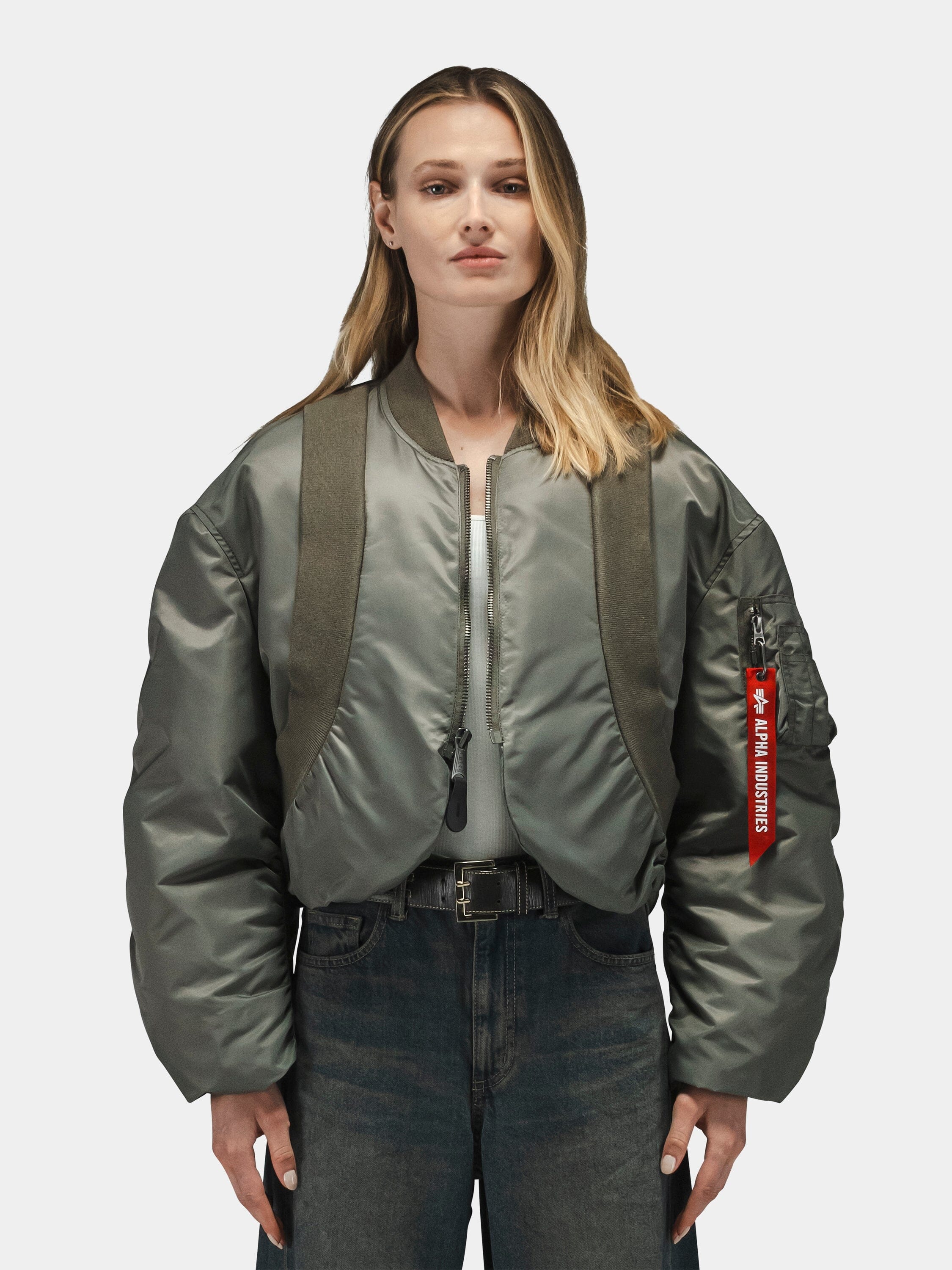 Alpha Industries Knit Rib MA-1 Flight Jacket Womens, gray bomber with red sleeve tag, ribbed knit details, front zipper closure.