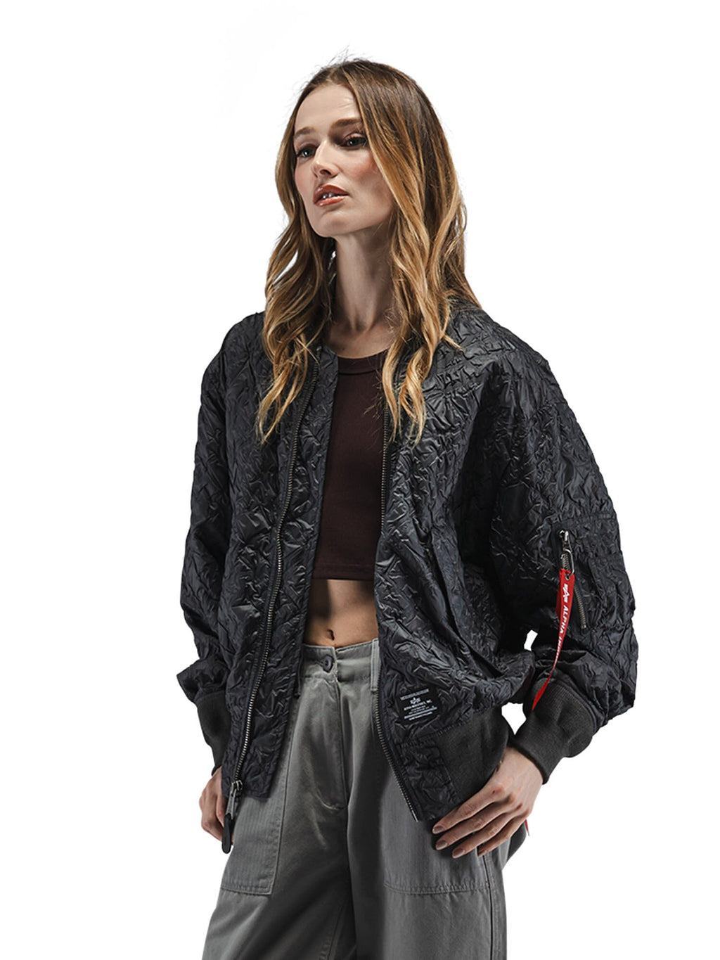 Alpha Industries L-2B Bubble Flight Jacket W, black bomber, textured outer shell, front zipper closure.