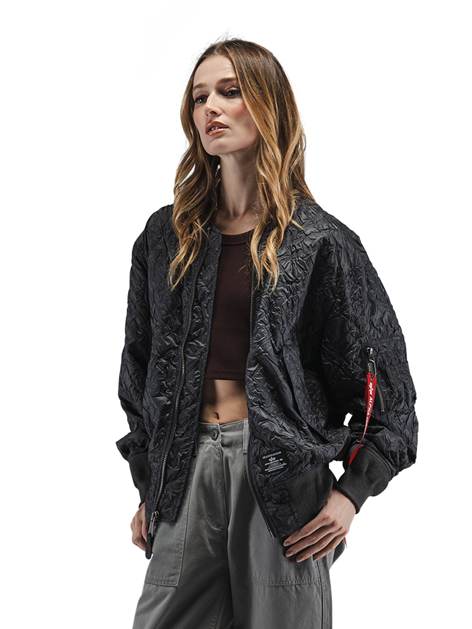 Alpha Industries L-2B Bubble Flight Jacket W, black bomber, textured outer shell, front zipper closure.