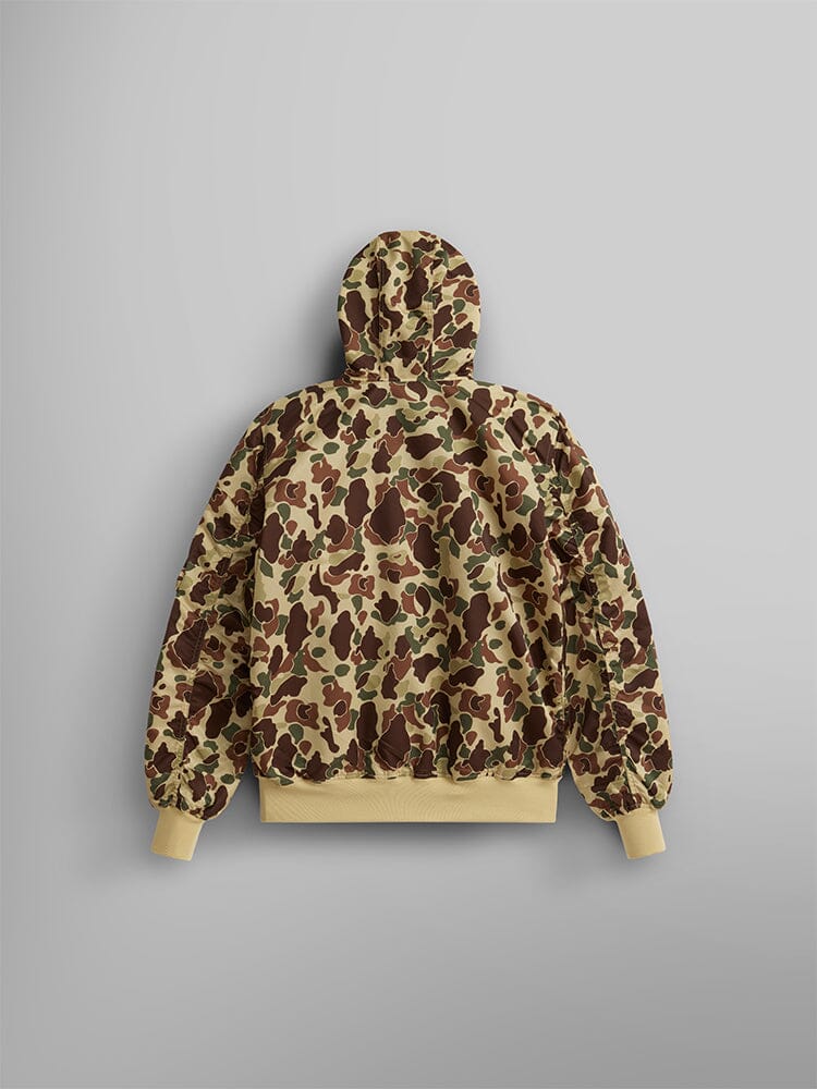 The L-2B Hooded Gen II Bomber Jacket by Alpha Industries, Inc. is a lightweight camouflage-patterned jacket, made from nylon for a sleek finish. This bomber features a water-resistant design with elastic cuffs and hem.