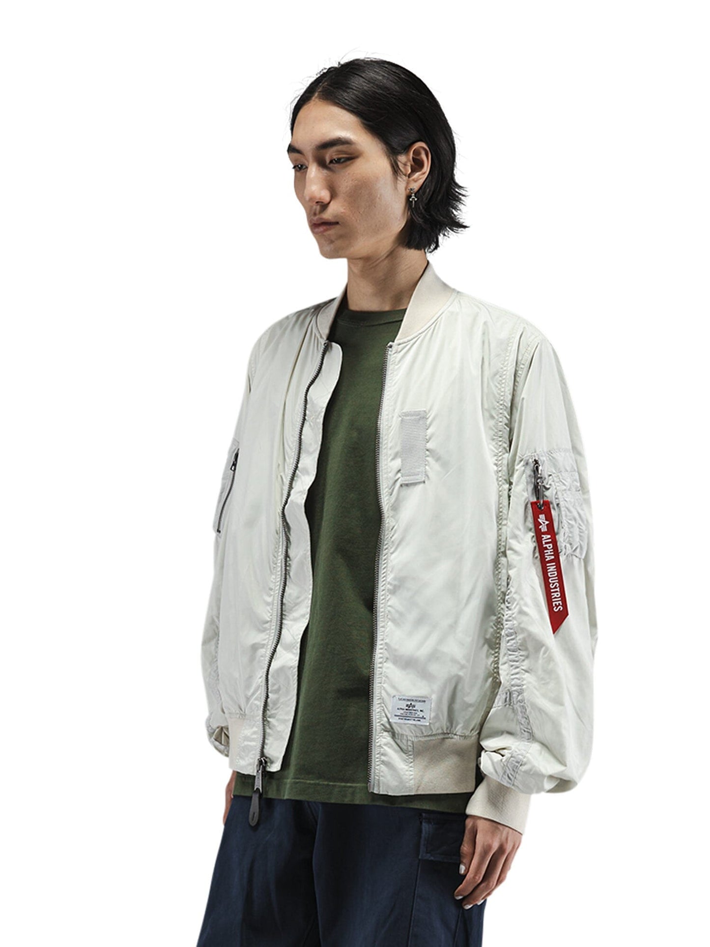 Alpha Industries L-2B Paratrooper Flight Jacket, light color, MA-1 design, front zipper closure.