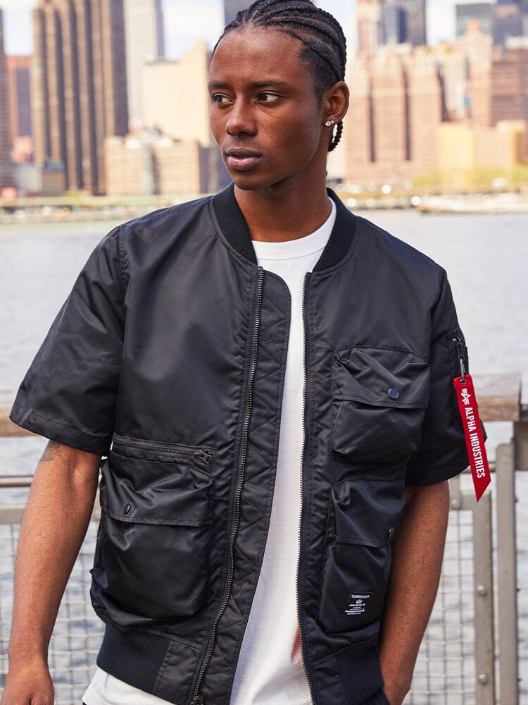 Alpha Industries L-2B Short Sleeve Bomber Jacket, utility pocket, white shirt.