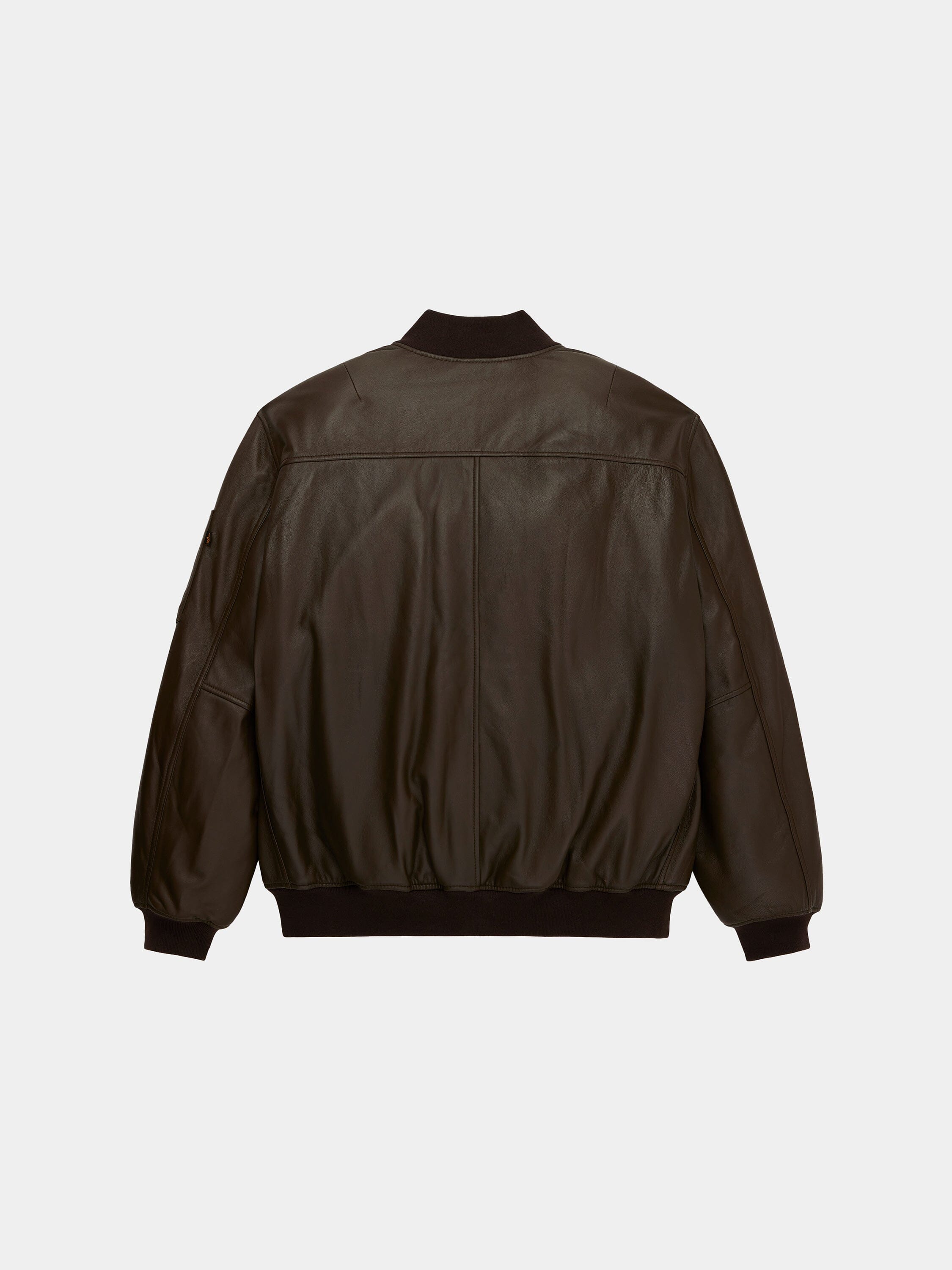 Alpha Industries Leather MA-1 Flight Jacket in dark brown Napa leather with black ribbed cuffs, hem, and collar.