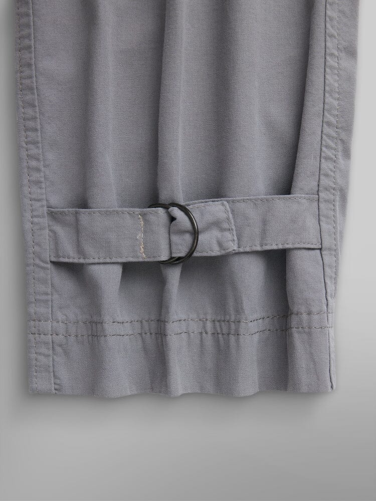 Alpha Industries Lightweight Trouser W in Grey; Garment-Washed Cotton, Stitched Hem, Adjustable Strap with Metal D-Ring Buckle at Cuff.