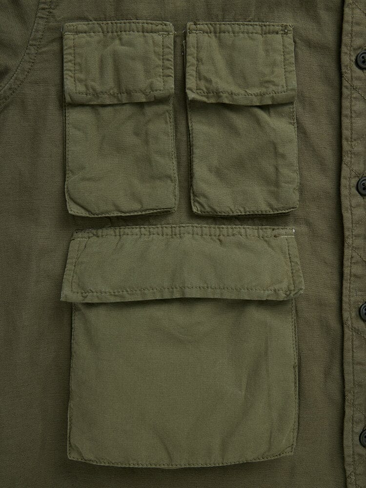 Long Sleeve Multi Pocket Shirt by Alpha Industries, og-107 green, collared design with two small square chest pockets and a larger rectangular pocket below, all with flap closures.