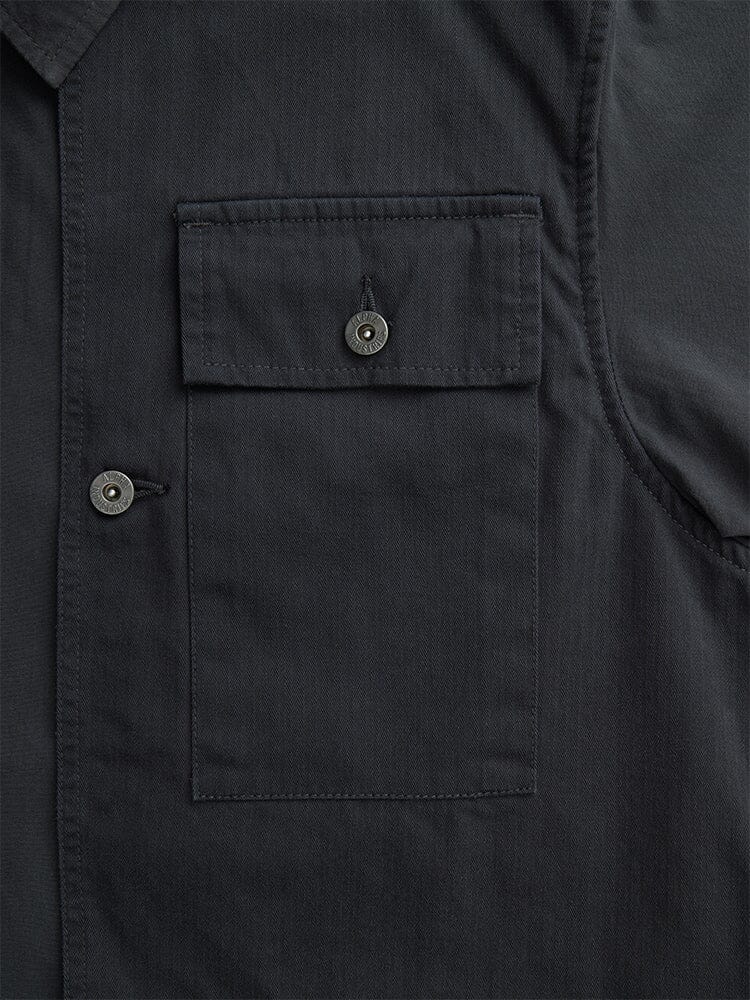 Alpha Industries LS P-44 Overshirt with buttoned flap chest pocket, visible stitching, and contrast fabric accents.