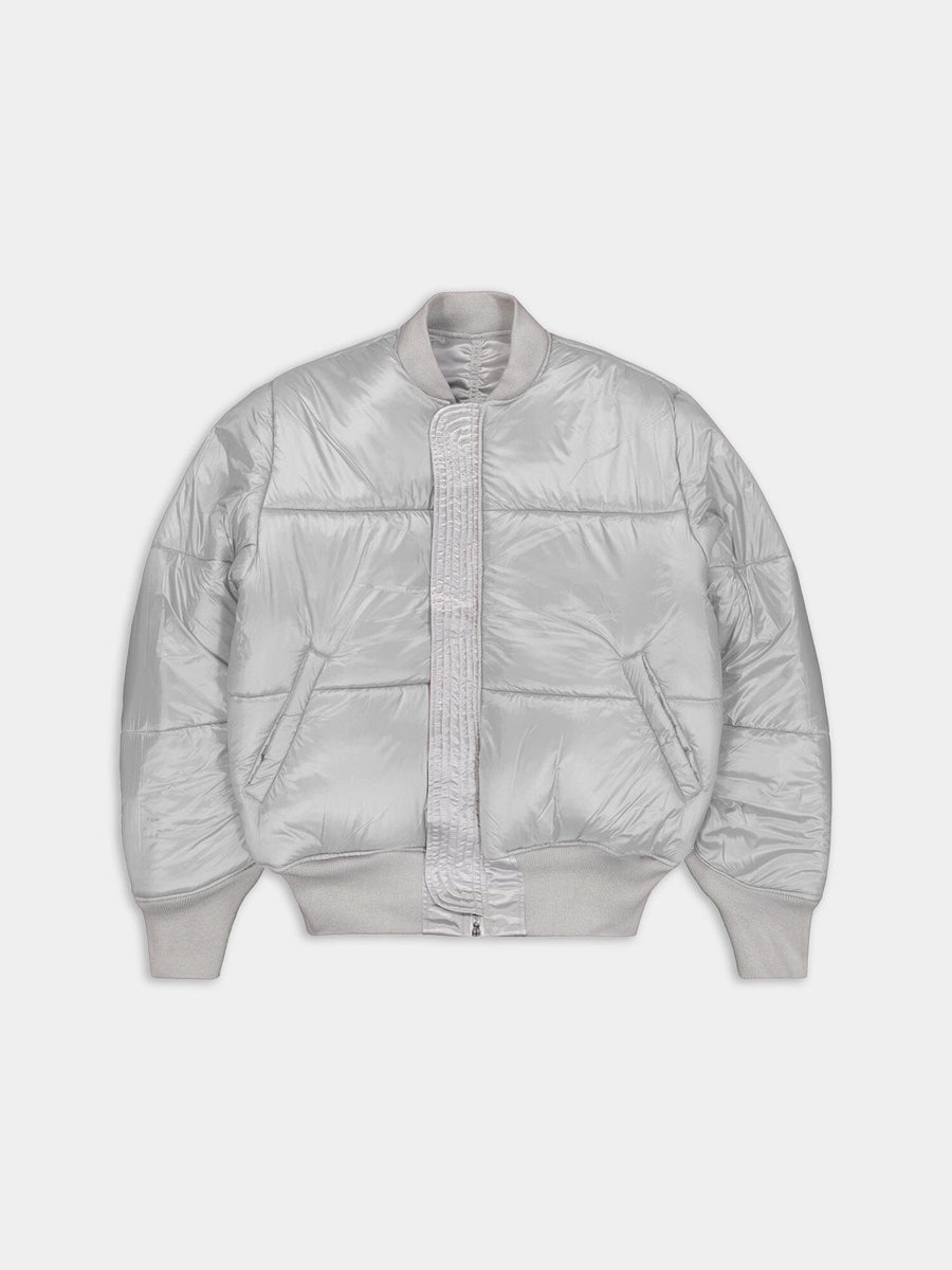 Alpha Industries MA-1 Flight Jacket, light gray, quilted bomber with ribbed cuffs, collar, hem, and front zipper closure.