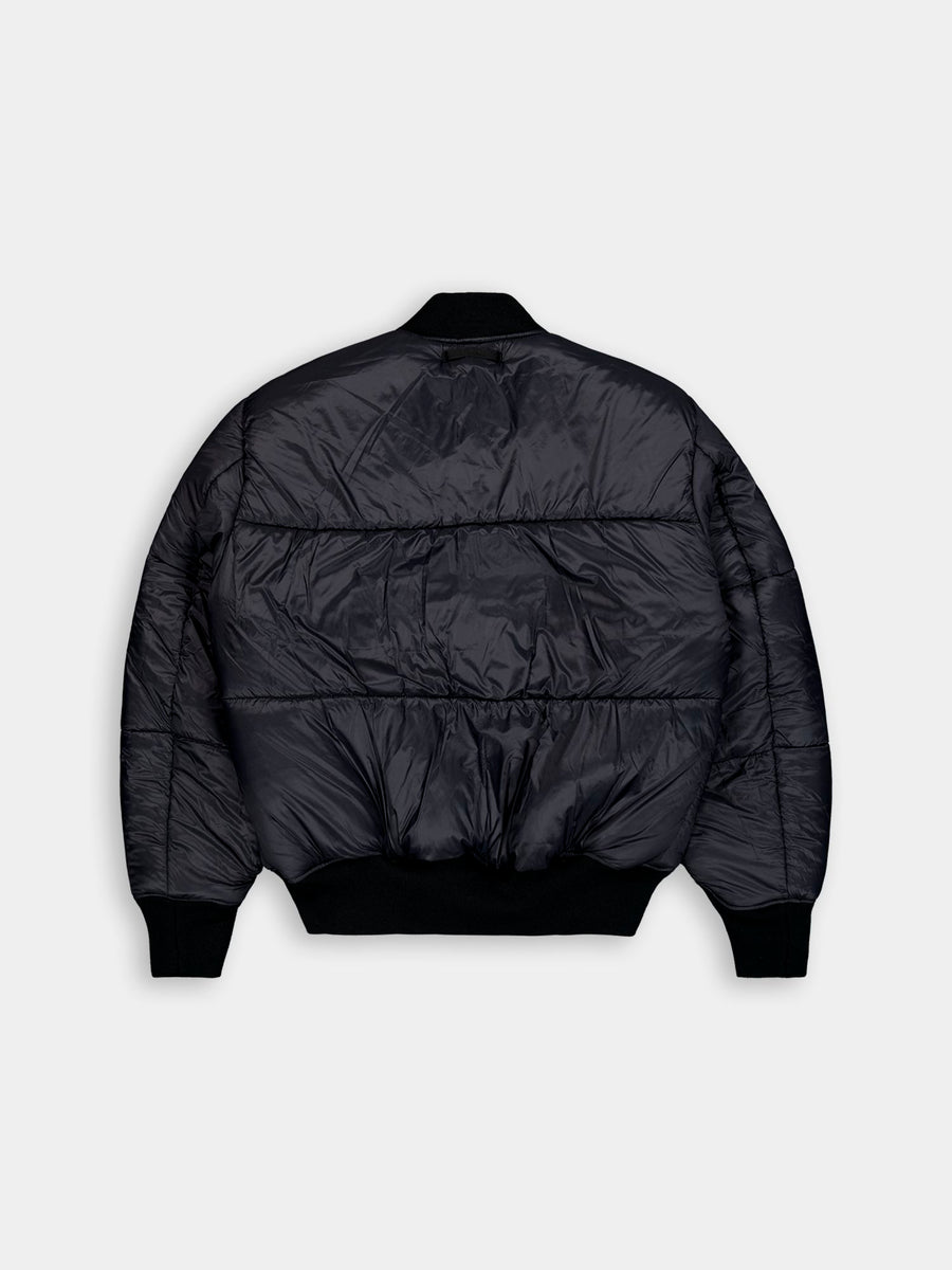Alpha Industries MA-1 3M Flight Jacket, black, shiny finish, ribbed collar, hem, and cuffs.