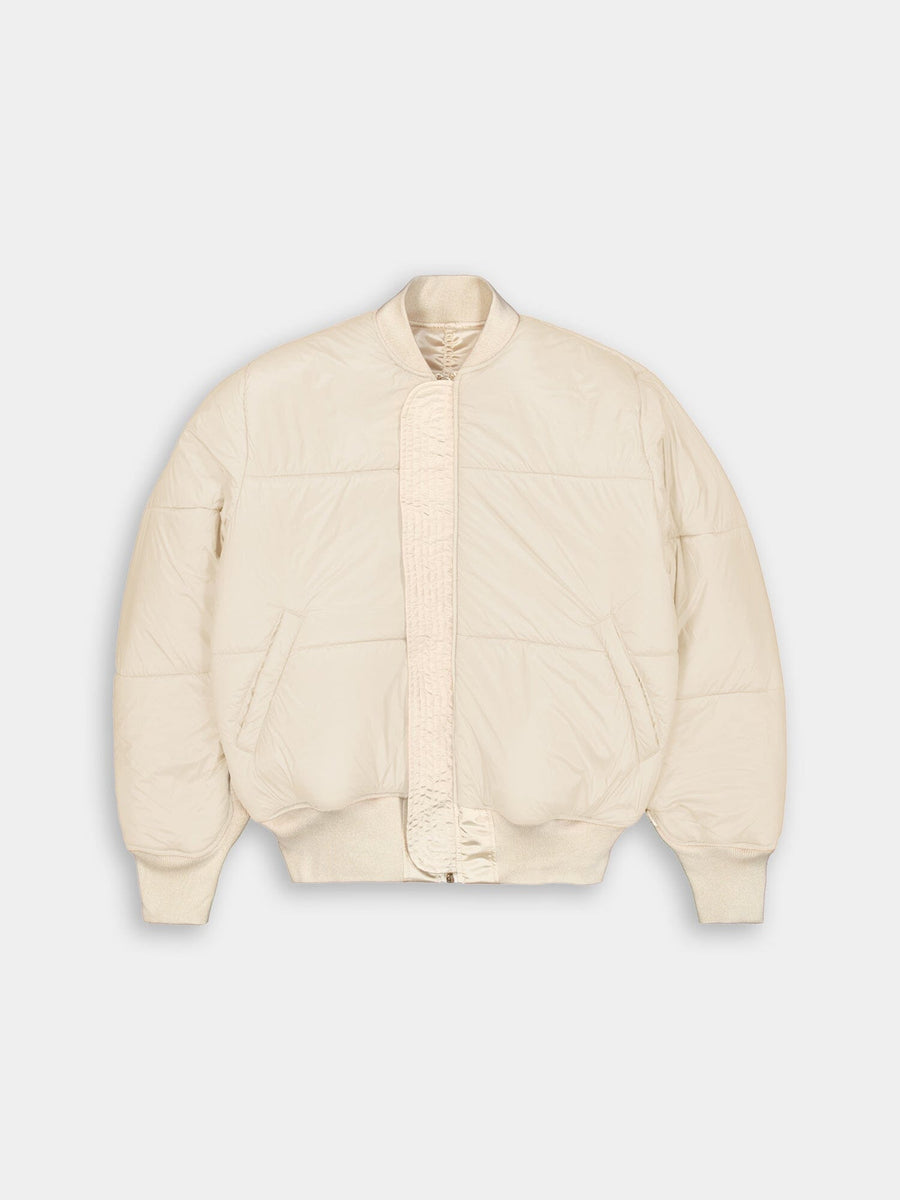 Alpha Industries MA-1 3M Flight Jacket, cream, puffy bomber with ribbed cuffs, collar, hem, snap front closure, two diagonal pockets.