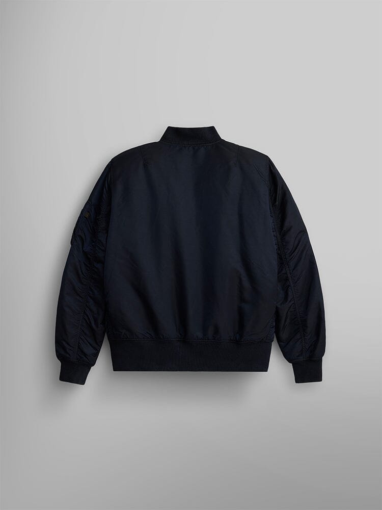 The MA-1 Battlewash Bomber Jacket by Alpha Industries, Inc. is a black jacket with long sleeves and a zipper closure, featuring a distinct Battlewash finish for enhanced style.