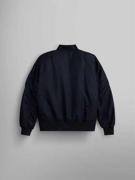 The MA-1 Battlewash Bomber Jacket by Alpha Industries, Inc. is a black jacket with long sleeves and a zipper closure, featuring a distinct Battlewash finish for enhanced style.