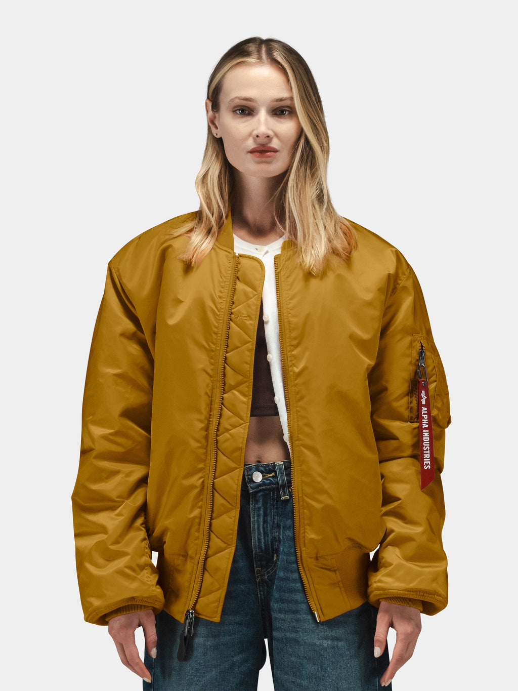 Mustard yellow MA-1 Bomber Jacket by Alpha Industries with front zipper closure, ribbed cuffs, and waistband.