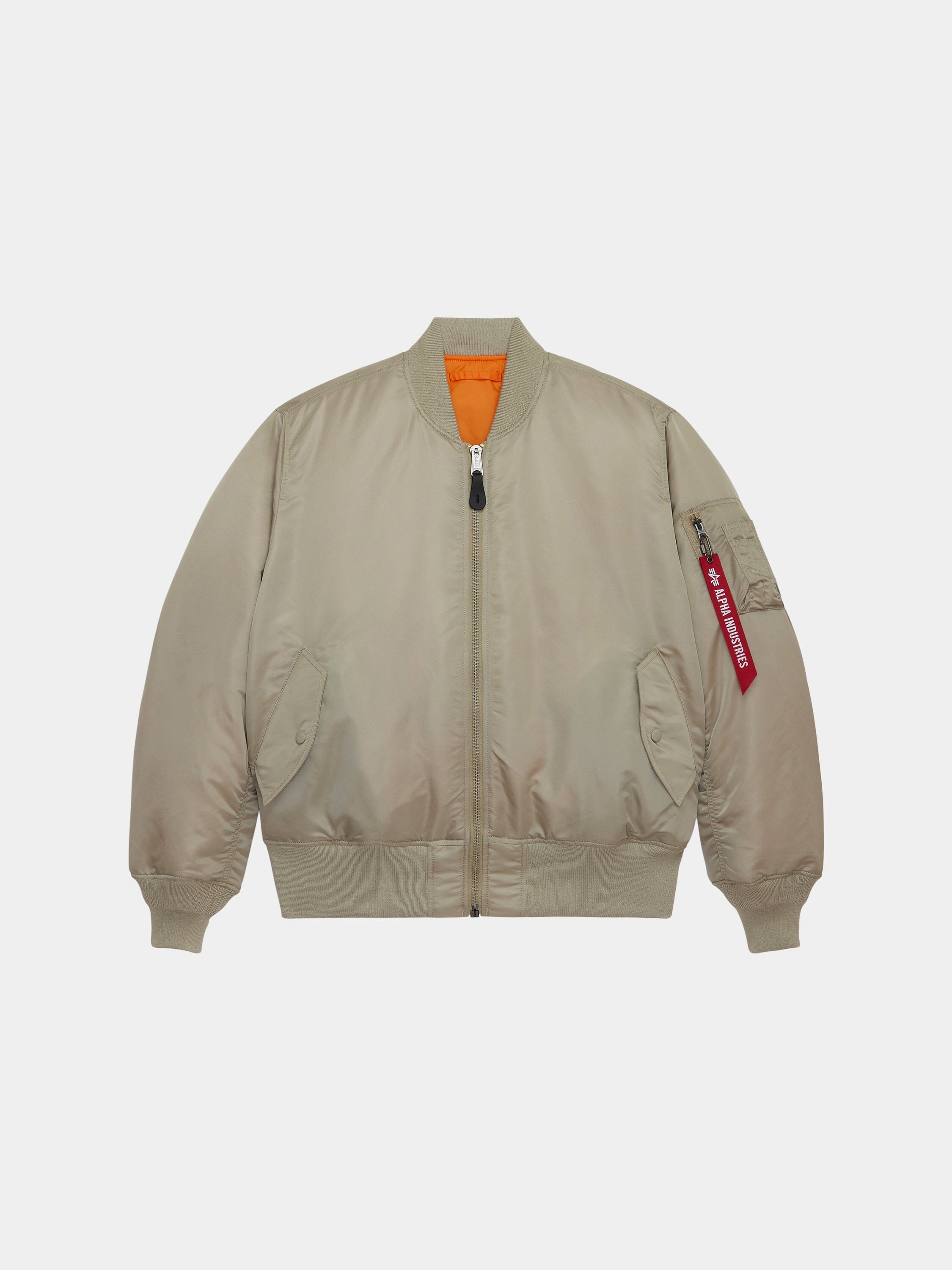 Alpha Industries MA-1 Bomber Jacket in Mineral with front zipper, ribbed cuffs and hem, two front pockets, orange lining, red tag.