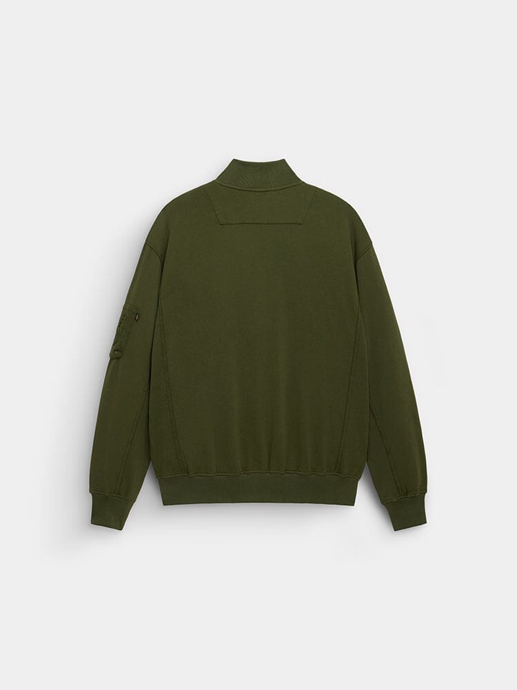 Alpha Industries MA-1 Fleece Jacket in olive green with ribbed cuffs, waistband, collar, and a zip pocket on the left sleeve.