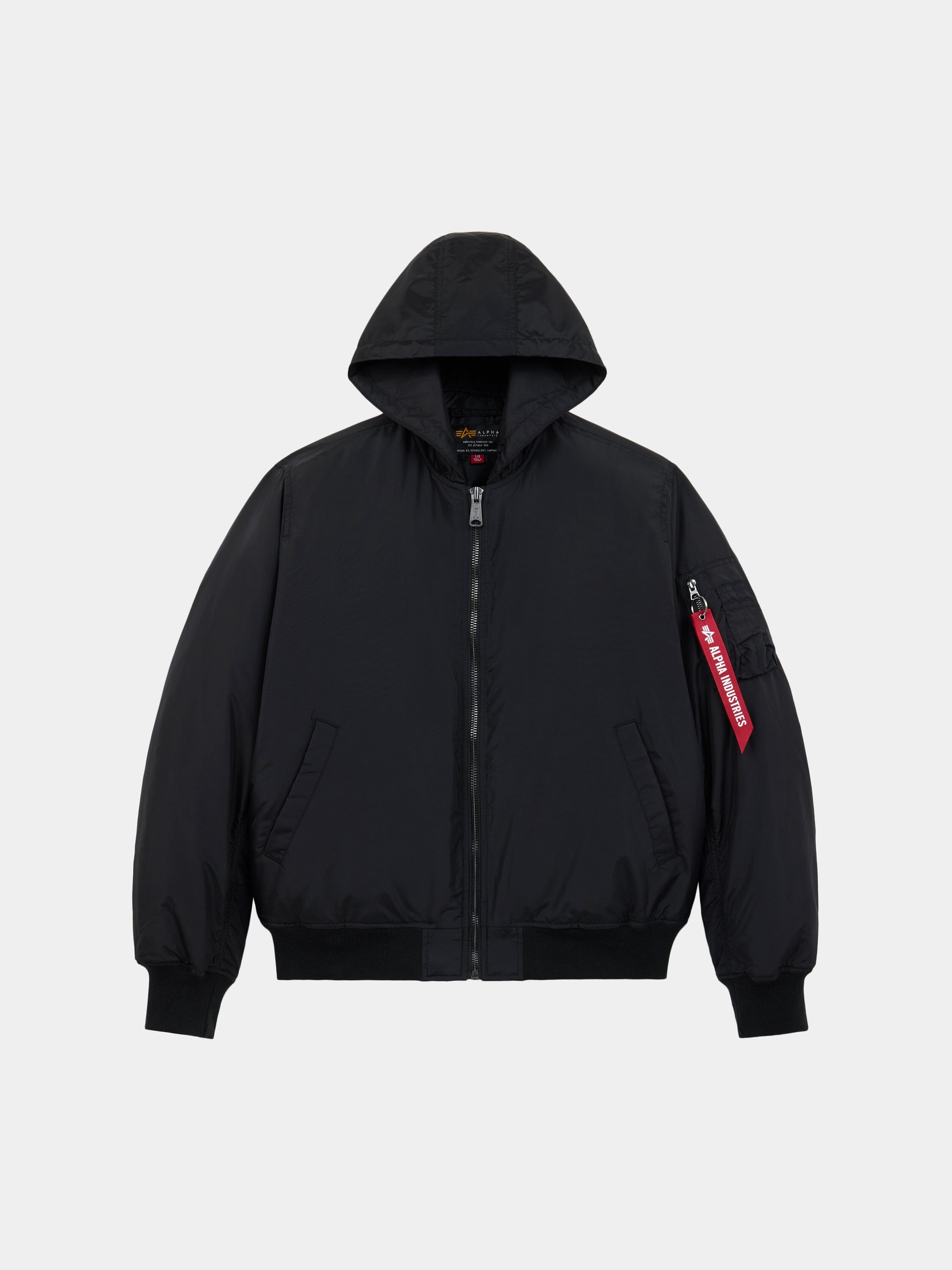 Alpha Industries MA-1 Hooded Oxford Flight Jacket in black with front zipper, two side pockets, ribbed cuffs and hem, red tag on sleeve.