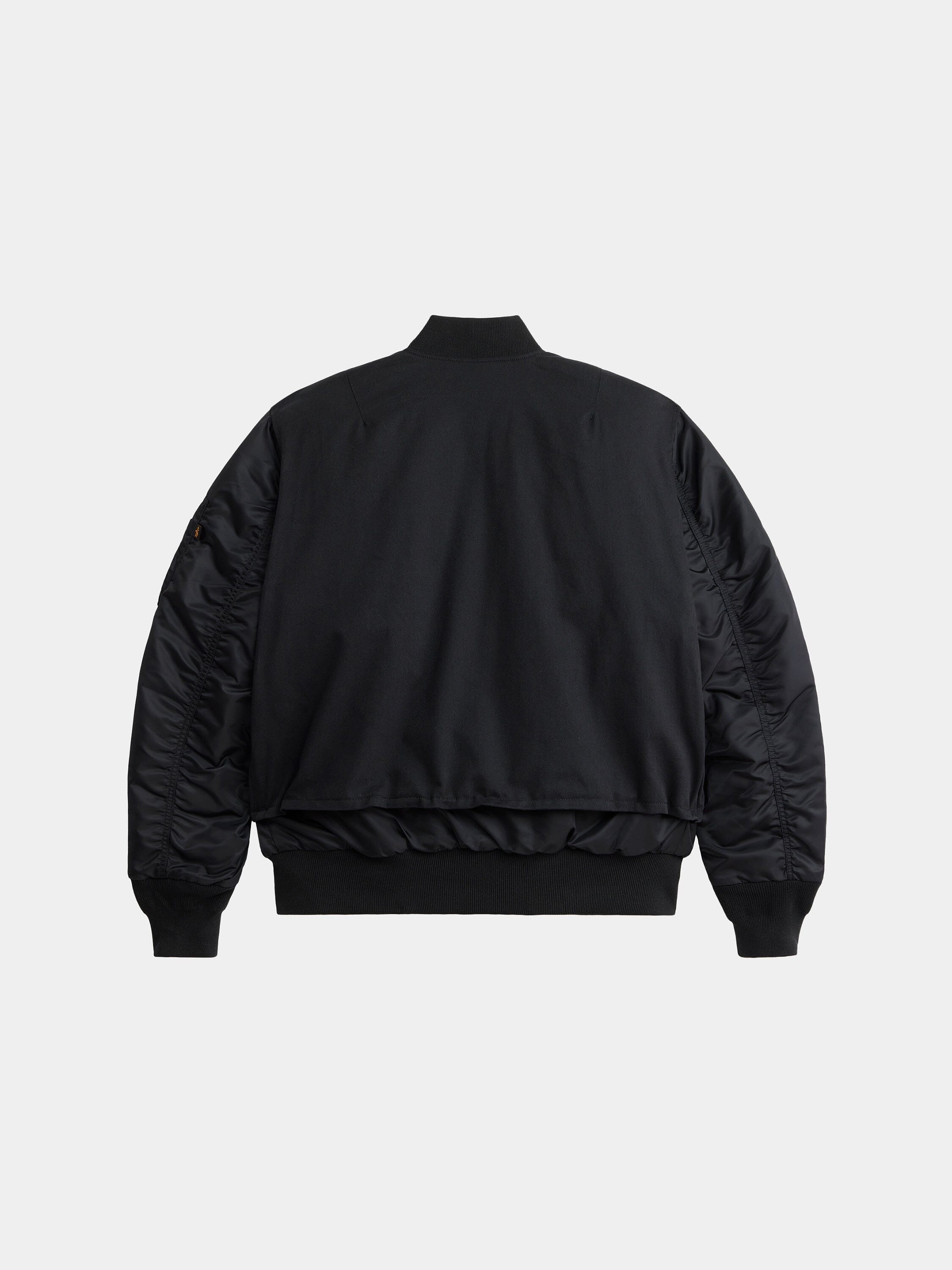 Alpha Industries MA-1 Mixed Cotton Flight Jacket with ribbed cuffs, waistband, collar, and smooth fabric on sleeves and body.