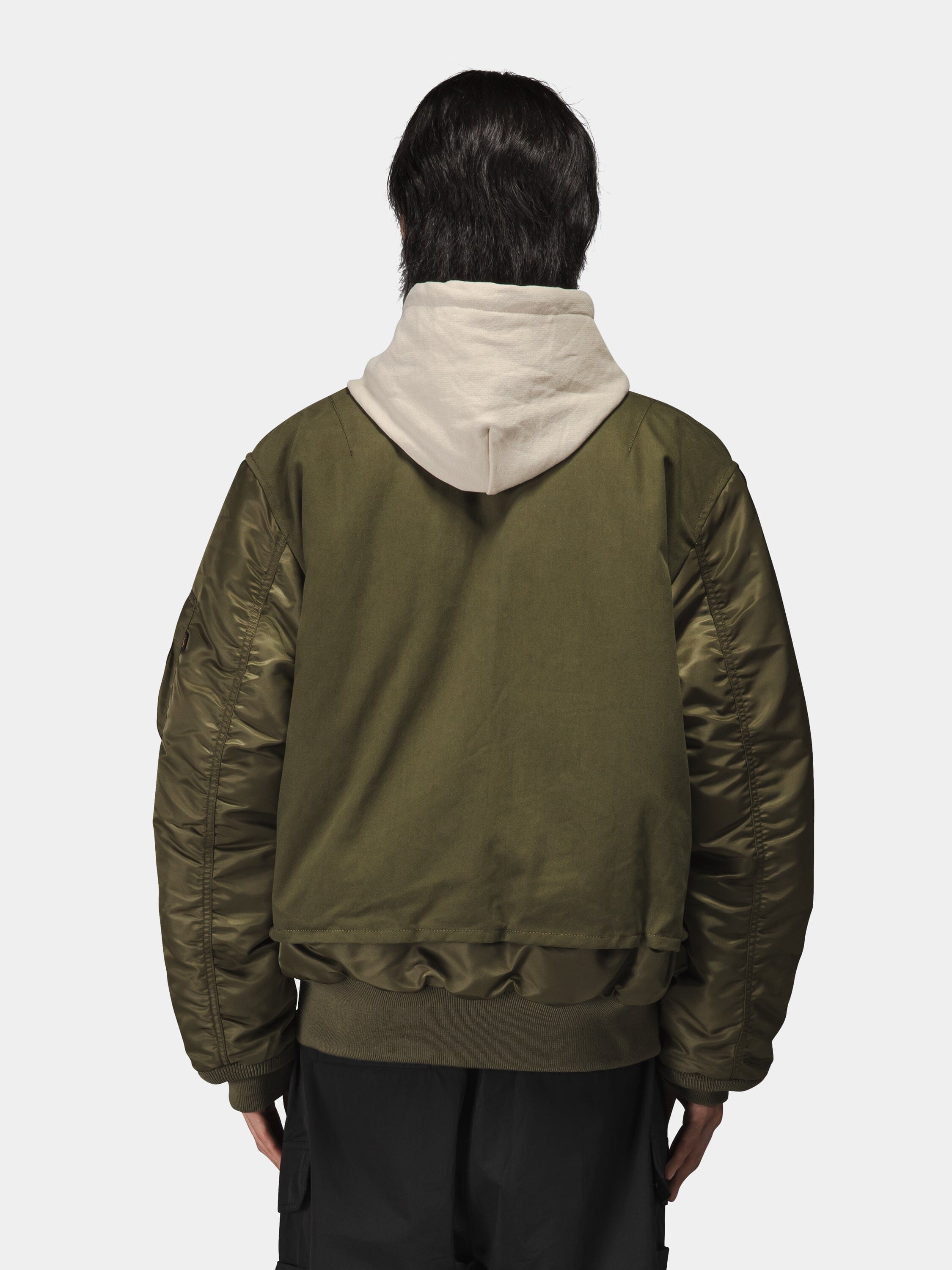 Alpha Industries MA-1 Mixed Cotton Flight Jacket, olive green, over beige hoodie.
