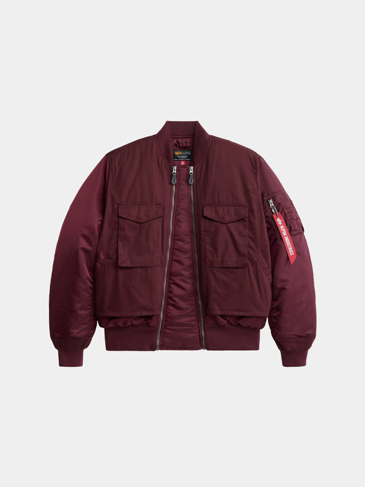 Alpha Industries MA-1 Mixed Cotton Flight Jacket in cedar red with front zip, ribbed cuffs and hem, front flap pockets, sleeve zip pocket.