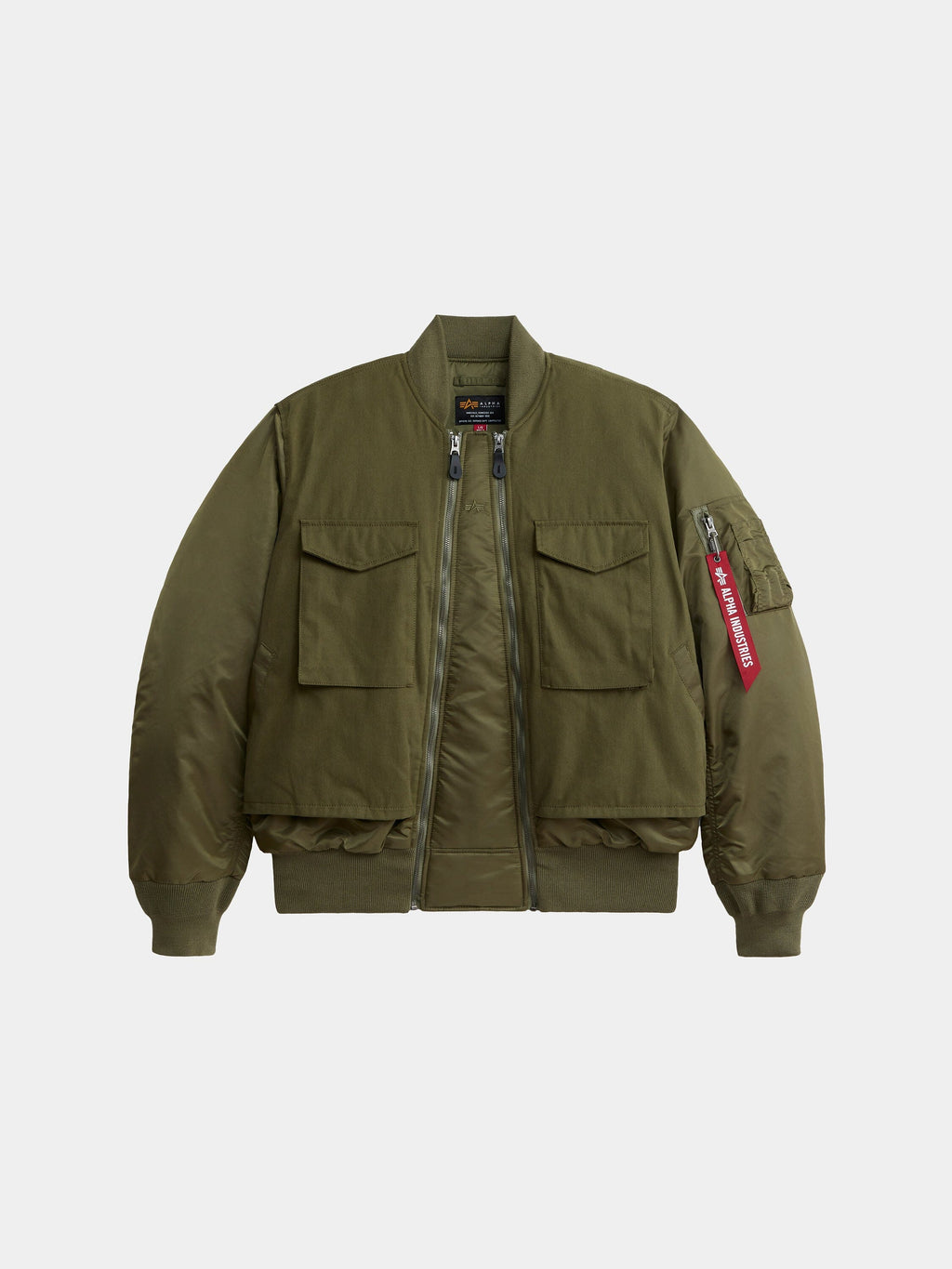 Alpha Industries MA-1 Mixed Cotton Flight Jacket in Og-107 Green with two front flap pockets, zip closure, ribbed cuffs and hem, red tag on sleeve zipper.