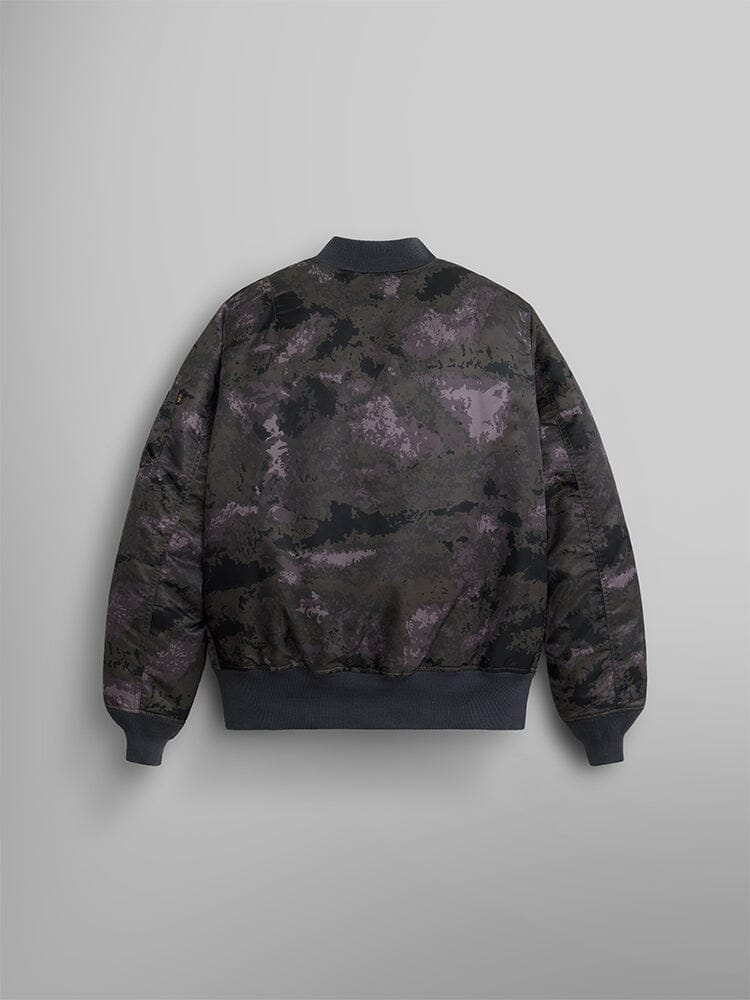 Alpha Industries MA-1 Mod Bomber Jacket with black, gray, and purple camouflage pattern.