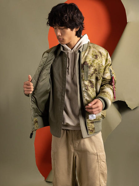 Alpha Industries MA-1 Mod Bomber Jacket, nylon material, front zipper closure, olive green color.