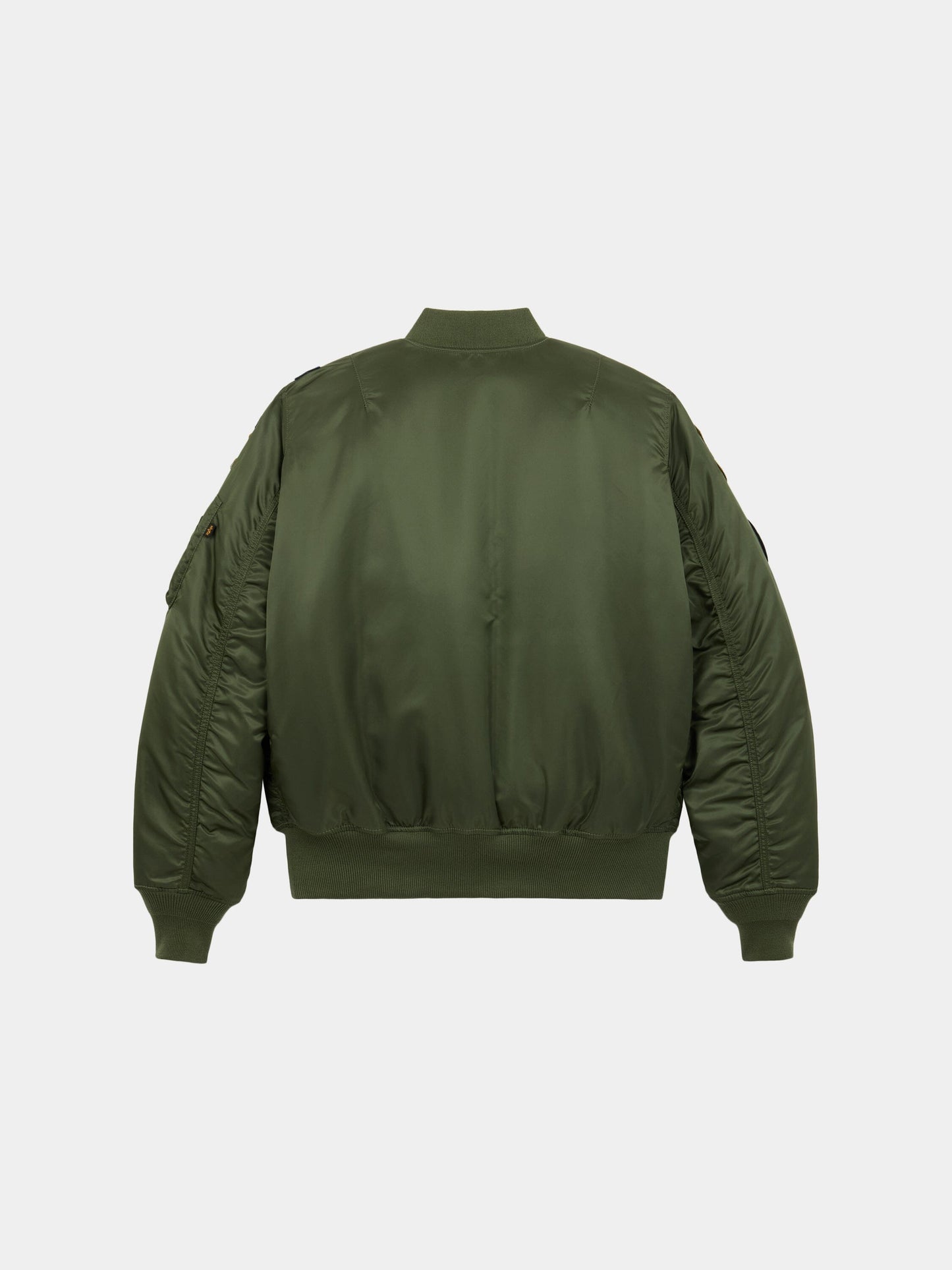 MA-1 Squadron Bomber Jacket by Alpha Industries in green with ribbed cuffs, waistband, collar, quilted sleeves, and water resistant.