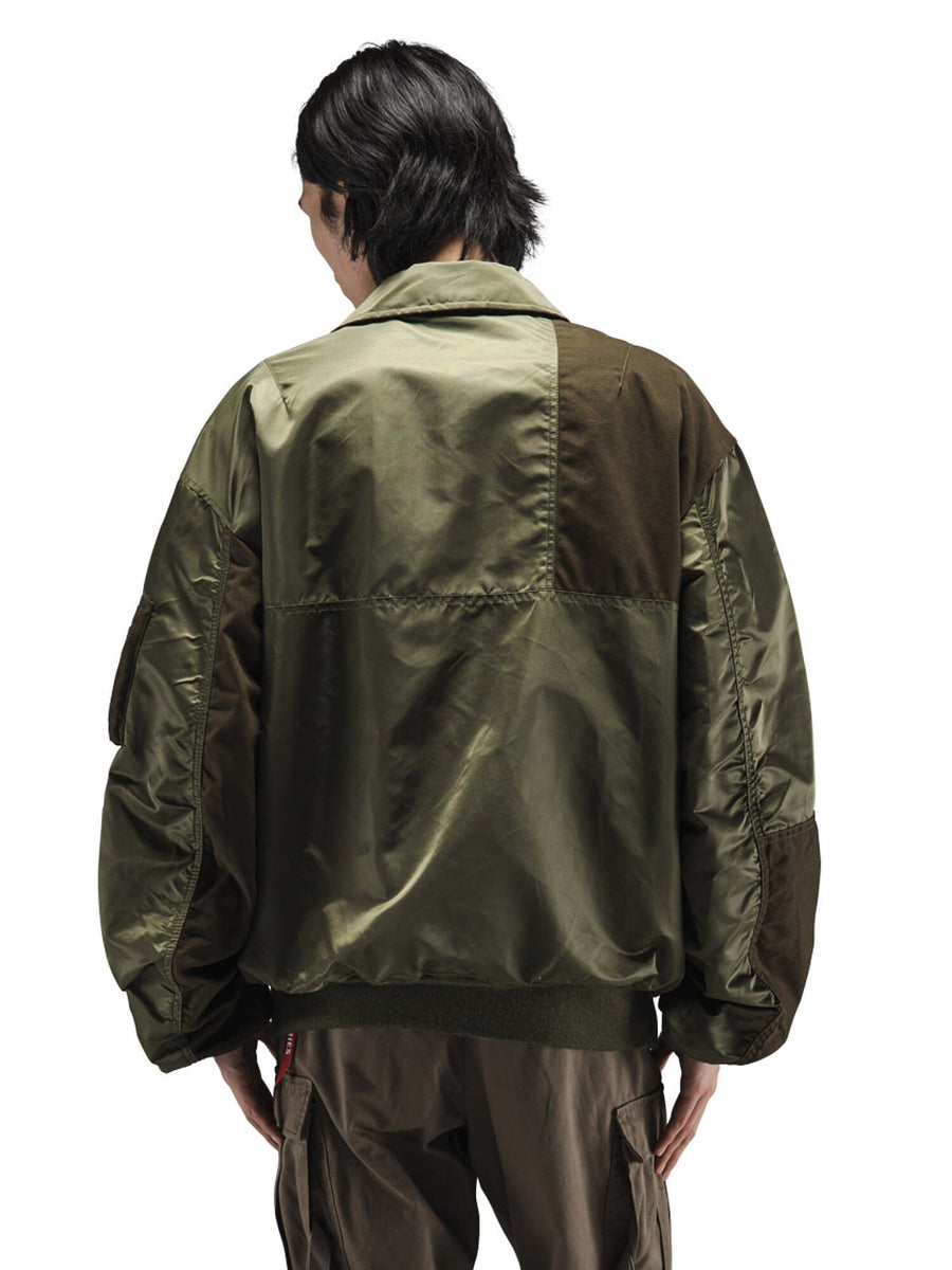 Alpha Industries Mixed Media CWU 36P Mod Jacket, olive green patchwork, oversized fit, MA-1 nylon material, front zipper closure.