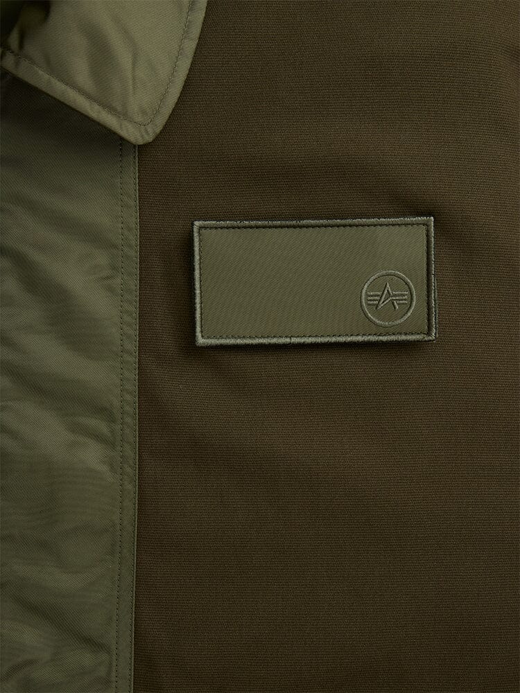 Alpha Industries Cwu 36p Mod Jacket, Olive-Green Fabric, Rectangular Patch With Embossed Star Emblem.