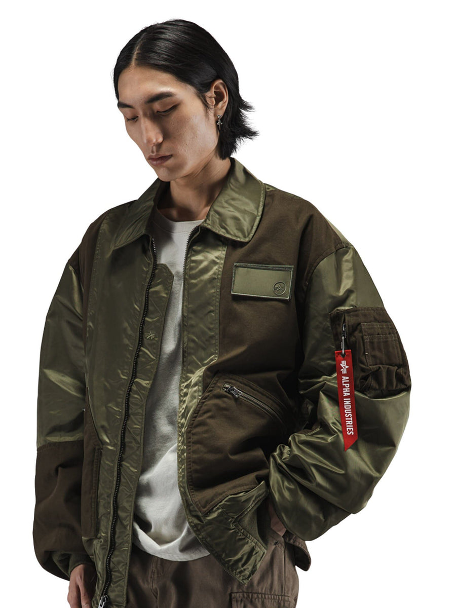 Alpha Industries Mixed Media CWU 36P Mod Jacket, red Remove Before Flight tag, zip closure.