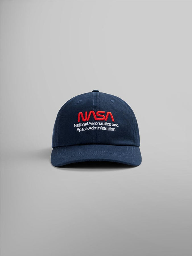 The Replica Blue NASA Worm Logo Cap by Alpha Industries features the iconic NASA Worm Logo embroidered in red and white on the front, complete with an adjustable strap for an ideal unisex fit.