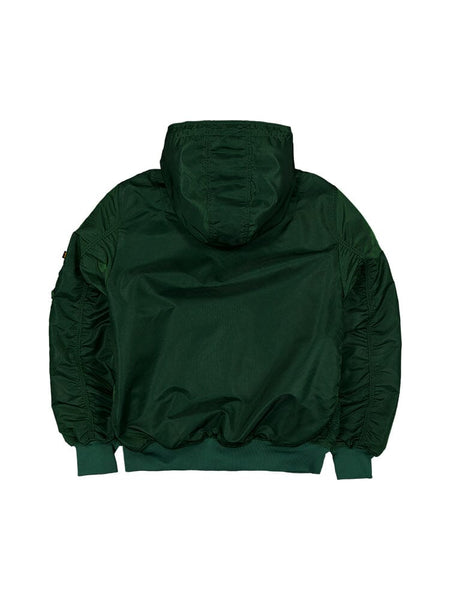 The back view of the New York Jets X Alpha X New Era L-2B Bomber Jacket from Alpha Industries, featuring a green color with ruched sleeves, showcases a classic New York Jets bomber style.