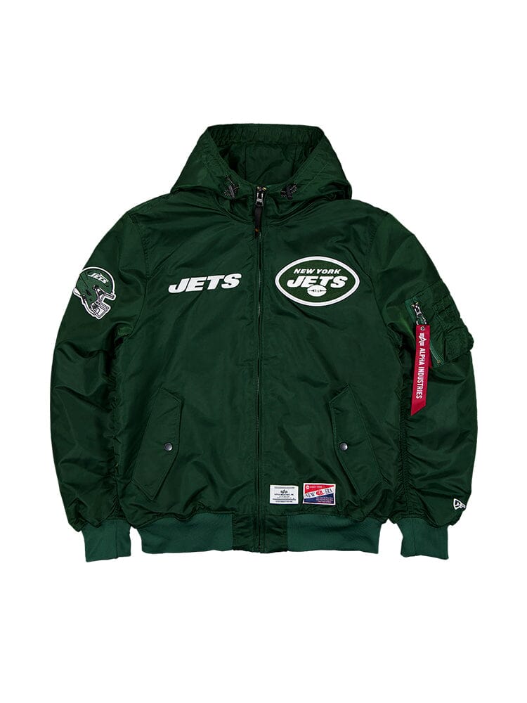 Fans of the NFL will love the New York Jets X Alpha X New Era L-2B Bomber Jacket by Alpha Industries, in a vibrant green color, featuring team logo patches and a trendy red tag on the sleeve.