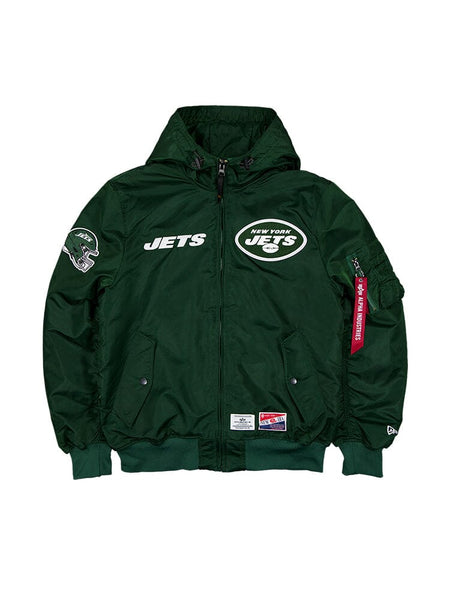 Fans of the NFL will love the New York Jets X Alpha X New Era L-2B Bomber Jacket by Alpha Industries, in a vibrant green color, featuring team logo patches and a trendy red tag on the sleeve.