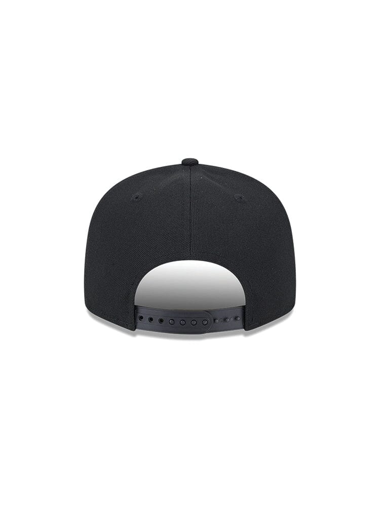 Back view of a black New York Yankees x Alpha Industries x New Era 950 cap with adjustable strap, featuring a subtle team logo for added style.
