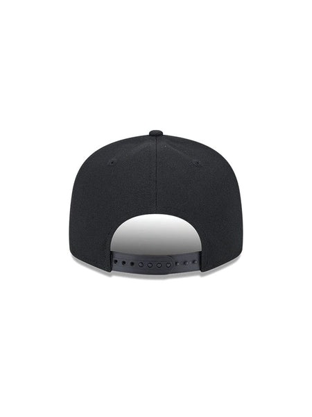 Back view of a black New York Yankees x Alpha Industries x New Era 950 cap with adjustable strap, featuring a subtle team logo for added style.