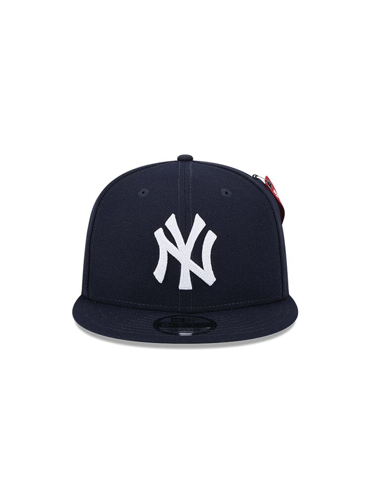 Front view of the navy blue New York Yankees x Alpha Industries x New Era 950 Cap, featuring a white interlocking NY team logo on the front.