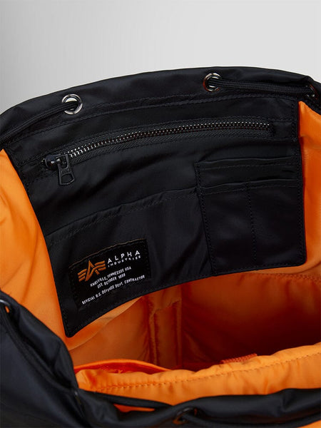 Alpha Industries Nylon Backpack, black, orange lining, zippered pocket, inner compartments, laptop sleeve, interior Alpha Industries label.