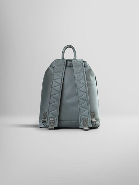 Alpha Industries Nylon Backpack in light gray with two padded shoulder straps, top carrying handle, and interior laptop sleeve.
